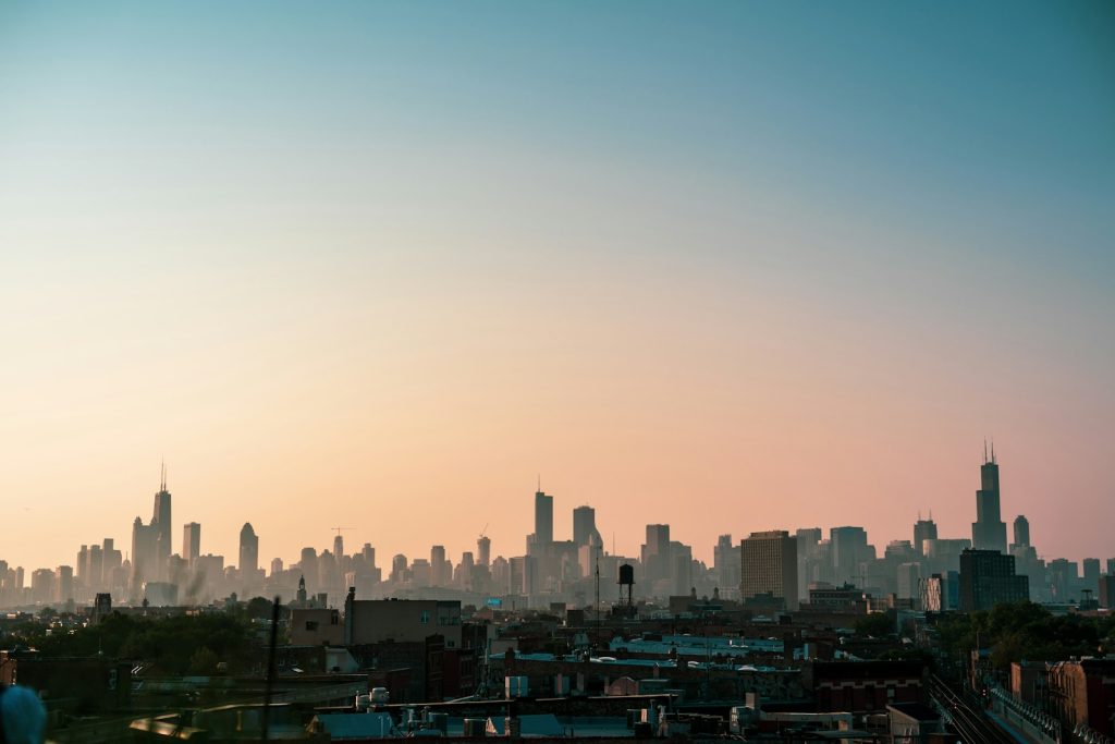 Chicago skyline at sunrise over Lake Michigan